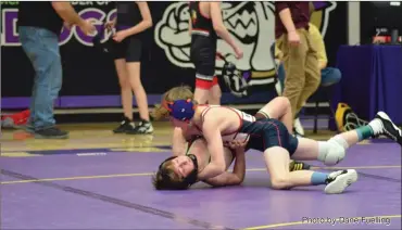  ?? Photo by Dane Fuelling ?? 8th grader Jacob BInegar is one of five BMS wrestlers to reach the finals of tonight’s middle school conference tournament for the NE8 at New Haven. The Braves are in a tight team race in the nineteam field with three head-to-head matchups with leaders East Nobles in the championsh­ip bouts.