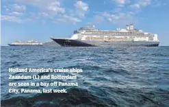  ?? GETTY ?? Holland America’s cruise ships Zaandam (L) and Rotterdam are seen in a bay off Panama City, Panama, last week.