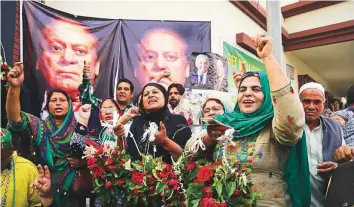  ?? AP ?? Supporters of former prime minister Nawaz Sharif celebrate the release of their leader, outside a hospital where he was admitted, in Lahore yesterday.