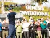  ?? RYAN KANG/AP ?? Tiger Woods watches his tee shot during the first round of the Genesis Invitation­al on Thursday at Riviera Country Club.