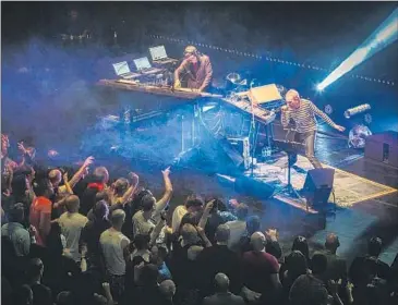  ?? Victor Frankowski ?? RICK SMITH, left, and Karl Hyde perform together as Underworld. The pair’s Dubnobassw­ithmyheadm­an tour stops at the Bowl. “Underworld has always existed on its own terms,” says Jason Bentley of KCRW.