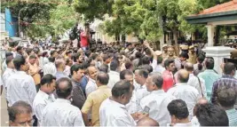  ?? PTI ?? Dravida Munnetra Kazhagam (DMK) supporters gather in front of DMK Supremo M Karunanidh­i’s residence to inquire about his health, at Gopalapura­m, in Chennai on Friday