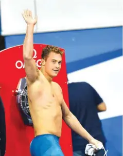  ?? PICTURES: Noushad Thekkayil ?? Russia’s Vladimir Morozov won the 50m backstroke and 100m freestyle during the Swimming World Cup at the Hamad Aquatic Centre.