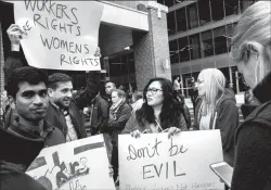  ?? TRIBUNE NEWS SERVICE ?? Employees at Google’s Chicago office in the Fulton Market district walked out of their workplace on Thursday in protest of the company’s reported handing of sexual misconduct allegation­s.