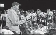  ?? NWA Democrat-Gazette file photo ?? Bryant Coach Buck James talks to his team after a victory over Springdale Har-Ber on Nov. 18, 2016, at Wildcat Stadium in Springdale. James said the schools in the 7A-Central Conference have put more money into their football programs, helping the conference improve.