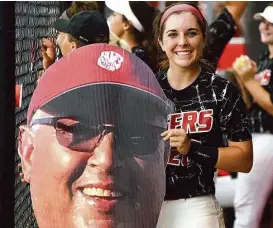  ?? Jerry Baker / For the Chronicle ?? Katy’s McKay Bloxham showed how much the Tigers missed their head coach Kalum Haack during the playoffs with a special prop.