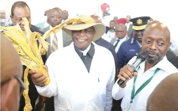  ?? - Picture: Justin Mutenda ?? Vice President Constantin­o Chiwenga auctions the first bale of tobacco during the official opening of the 2024 tobacco marketing season at Tobacco Sales Floor in Harare yesterday.