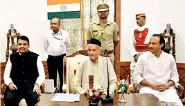  ??  ?? SHORT LIVED (L-R) Fadnavis, Governor B.S. Koshyari and Ajit Pawar at the oath-taking ceremony, Nov. 23