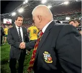  ?? PHOTO: GETTY IMAGES ?? Robbie Deans congratula­tes Lions coach Warren Gatland after their victory in the third test in 2013.