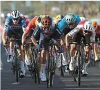  ?? | PHOTO : AFP ?? Caleb Ewan règle le sprint devant Bryan Coquard.