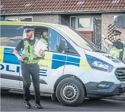  ??  ?? Police outside the property yesterday.