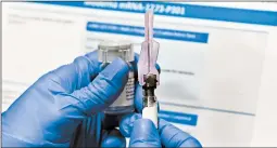  ?? HANS PENNINK/AP ?? Joe Biden’s team wasn’t invited to the Trump administra­tion’s vaccine summit. Above, a nurse prepares a syringe during a COVID-19 vaccine study in July in Binghamton, New York.