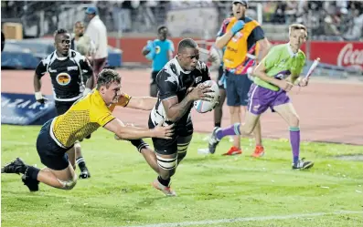  ?? Picture: SUPPLIED ?? TRY LINE FEVER: WSU All Blacks flanker Mihlali Mosi dives for the line during the Varsity Shield rugby match against the NMU Madibaz at the Madibaz Stadium in Port Elizabeth on Friday night.