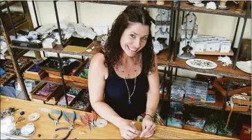  ?? Contribute­d photo ?? Jewelry maker Susan Roberts of Branford in her studio. She is scheduled to be at the upcoming Guilford Art Center Summer Shopping Pop Up Series.