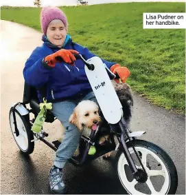  ?? ?? Lisa Pudner on her handbike.