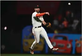  ?? JOSE CARLOS FAJARDO — BAY AREA NEWS GROUP ?? The San Francisco Giants’ Evan Longoria (10) throws out the Colorado Rockies’ Ezequiel Tovar at first base for the final out in the ninth inning at Oracle Park in San Francisco on Thursday, Sept. 29.