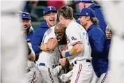  ?? Godofredo A. Vásquez/Associated Press ?? Adolís Garcia’s walk-off Friday night gave the Texas slugger a home run in five consecutiv­e games.