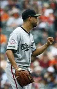  ?? PATRICK SEMANSKY — THE ASSOCIATED PRESS ?? Washington Nationals starting pitcher Gio Gonzalez gestures as he walks off the field after being relieved in the eighth inning of an interleagu­e baseball game against the Baltimore Orioles, Monday in Baltimore.