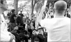  ??  ?? People gather to begin a march in Bangkok, Thailand, in this still image obtained from social media video.