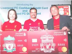  ??  ?? The new Liverpool FC credit and debit card launched by (from left) Mastercard head of strategic accounts Eunice Chan, StanChart Malaysia managing director and chief executive officer Abrar Anwar and Mastercard country manager of Malaysia and Brunei Perry Ong.