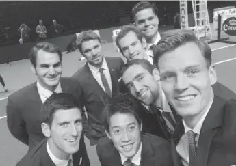  ?? TWITTER ?? Tennis stars posing for selfie by Tomas Berdych, right, ahead of the ATP World Tour Finals: (back) Roger Federer, Stan Wawrinka, Andy Murray, Milos Raonic, (front) Novak Djokovic, Kei Nishikori, Marin Cilic, Berdych.