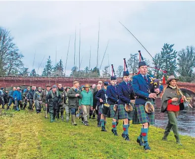  ?? Pictures: Steve Macdougall. ?? Parade led by Pipe Major Alistair Duthie and Claire Mercer Nairne.