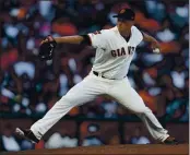  ?? NHAT V. MEYER — BAY AREA NEWS GROUP, FILE ?? The Giants’ Tony Watson throws against the Phillies in the seventh inning at Oracle Park in San Francisco on Aug. 11.