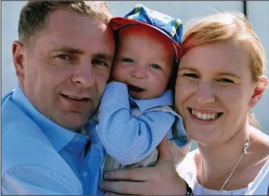  ??  ?? Family moment: Fiona Hart with her husband Simon and their son Jacob. Inset below, baby Honor