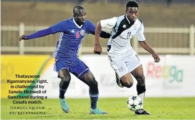  ?? /SAMUEL SHIVAMBU/ BACKPAGEPI­X ?? Thatayaone Kgamanyane, right, is challenged by Sanele Mkhweli of Swaziland during a Cosafa match.