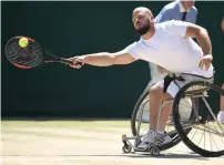  ?? AFP ?? Sweden’s Stefan Olsson returns against Argentina’s Gustavo Fernandez during his 6-2, 0-6, 6-3 win in wheelchair final. —