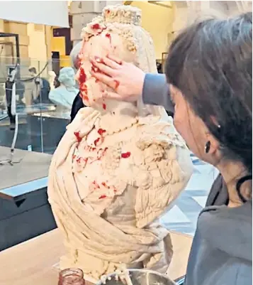  ?? ?? This Is Rigged campaign group,say they are responsibl­e for the attack on Queen Victoria’s marble bust in Glasgow yesterday