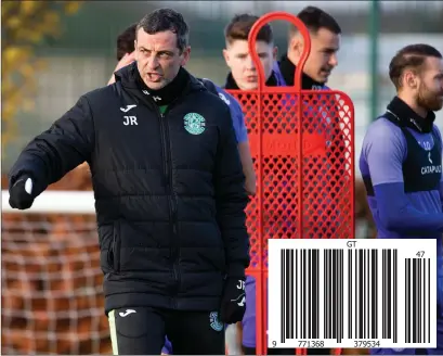  ?? ?? Hibs manager Jack Ross puts his players through their paces at training ahead of the Ross County game tonight