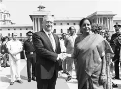  ??  ?? Mattis (left) shakes hands with Indian Defence Minister Nirmala Sitharaman at the Indian Ministry of Defence prior to a meeting in New Delhi. — AFP photo