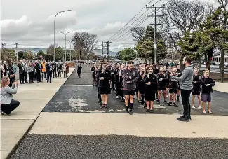  ??  ?? Whakarongo School’s Kapa Haka group performs in what used to be the middle of a high-speed road.