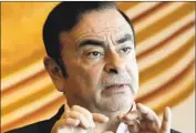  ?? Kin Cheung Associated Press ?? CARLOS GHOSN is facing trial on charges of aggravated breach of trust and filing false statements to regulators regarding $80 million in deferred income.