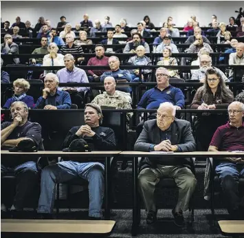  ?? SALWAN GEORGES/WASHINGTON POST ?? Church leaders and congregati­on members attend the Carroll County Public Safety Training Center in Westminste­r, Md., to learn techniques to defend themselves if a gunmen bursts into their church and begins shooting. Among the suggestion­s? Throw hymnals...