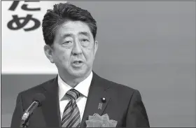  ?? AP/SHIZUO KAMBAYASHI ?? Japanese Prime Minister Shinzo Abe offers his case Wednesday in Tokyo for revising his nation’s constituti­on in the face of North Korea’s provocativ­e behavior.