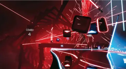  ??  ?? Beat Saber’s busier tracks can produce a genuine workout, but also result in injuries – we may have punched a door handle while playing, and given ourselves minor whiplash thanks to the added weight of the headset