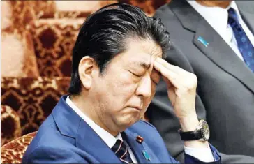  ?? KAZUHIRO NOGI/AFP ?? Japan’s Prime Minister Shinzo Abe gestures during a session of the upper house budgetary committee at parliament in Tokyo on Monday.