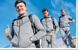  ??  ?? CONFIDENT: Harry Maguire gives thumbs-up on plane steps