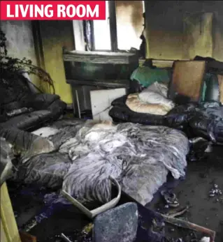  ??  ?? LIVING ROOM Wreck: The blackened walls and windows of the living room. Much of the furniture appears to have survived