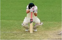  ?? GETTY IMAGES ?? England captain Joe Root feeling unwell at the crease under the blazing Australian sun.