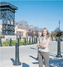  ?? Michelle Hofer for the Calgary Herald ?? Andrea Davis-Yue and her husband are owners of a new townhome in Quarry Park. “We were just looking at properties in the area and immediatel­y got excited about Quarry Park. It escalated from there.”