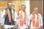  ?? HT PHOTO ?? Fivetime MLA of the Congress, Kunvarji Bavaliya (centre), BJP leaders after joining the party in Ahmedabad on Tuesday.
