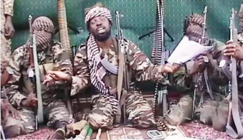  ??  ?? Boko Haram leader, Shekau, in a still from an undated video