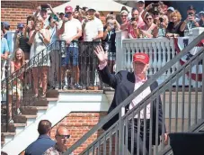  ?? KELVIN KUO, USA TODAY SPORTS ?? President Donald Trump waves to the crowd Sunday during the final round of the U.S. Women’s Open golf tournament at Trump National Golf Club-New Jersey.