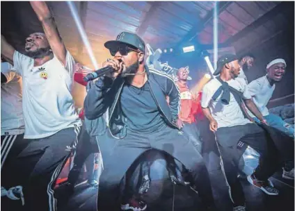  ??  ?? Get down: Enjoylife (above) perform at Red Bull Culture Clash at 787 Windsor in Atlanta. The crowd’s response (below) is a taste of what’s to come this weekend. Photos: Cam Kirk/ Red Bull Content Pool