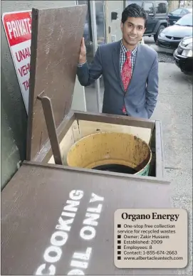  ?? Dean Bicknell, Calgary Herald ?? Organo Energy and Alberta Clean Technologi­es owner Zakir Hussein shows off one of the cooking oil bins supplied by his company.