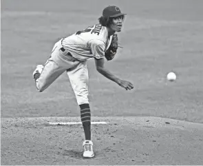  ?? CHARLIE RIEDEL/AP ?? Cleveland starting pitcher Triston Mckenzie throws during the first inning of a game against the Kansas City Royals on Sept. 2 in Kansas City.