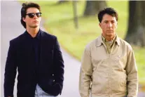  ??  ?? Tom Cruise, left, played second fiddle to Dustin Hoffman’s Raymond in the 1988 movie Rain Man, which was groundbrea­king at the time.